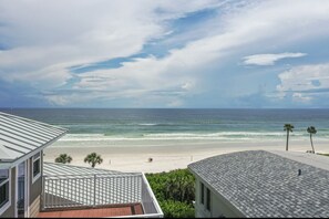 House is directly on the beach with private beach walkway. 