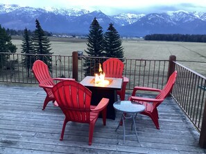 Enjoy a fire while relaxing on the deck.