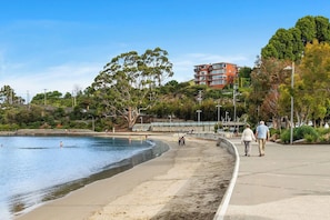 Long Beach Reserve offers activities for all ages, with a playground for kids, swimming, beach strolls, and scenic picnic spots perfect for relaxing and enjoying nature.