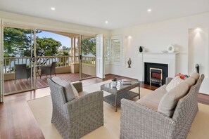 The parents' retreat features an indoor fireplace, and a private balcony where you can enjoy quiet mornings with a cup of coffee and beach views.