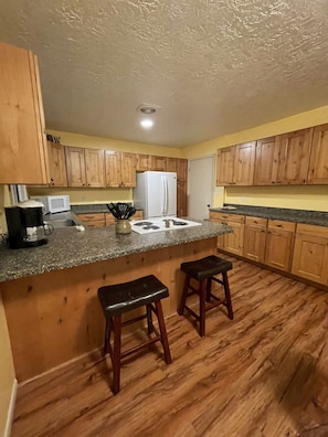 Kitchen island with stove and oven