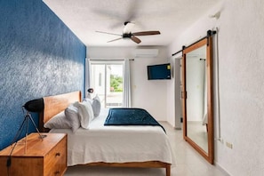 Master bedroom and view of balcony