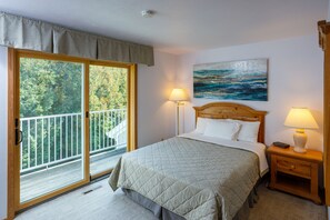 The primary bedroom includes a private balcony