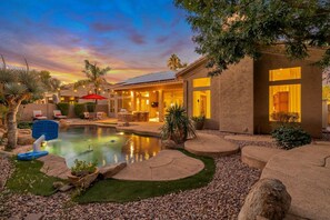 The backyard is great for entertaining w/ BBQ grill, wood burning fireplace & outdoor seating