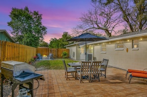 Fully fenced-in, private outdoor backyard with propane grill/fire pit/chaise(s)
