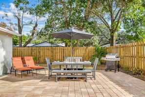 Fully fenced-in, private outdoor backyard with propane grill/fire pit/chaise(s)