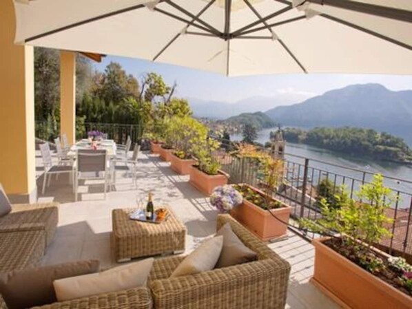 Relax, dine or take in the sun on your private lake view terrace. 