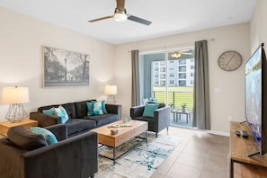 Living Room with Pool View!#Disney #Parks #kingdom #springs #StoreyLake #Apartment #Vacation #Rental #waterpark #Kissimmee #Orlando #universal #citywalk