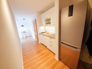 Ferienwohnung, 68 m², 2 Schlafzimmer, 2 Balkone-Ferienwohnung Hammer - Alpenblick - Eingang Küche