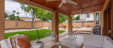 Private backyard with covered patio 