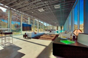 Sprawling living area with flat screen TV and streaming services