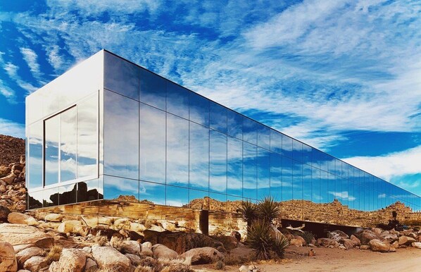 Welcome to Invisible House Joshua Tree, a magnificent 22-story horizontal skyscraper