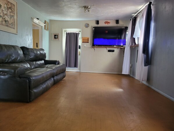 3 seat sofa, 55 inch smart t.v. lots of l8ght.