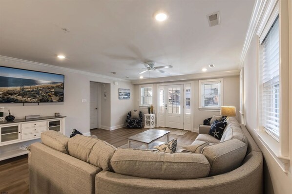 Spacious minimalist themed living room area
