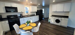 Kitchen with all-in-one washer and dryer combo