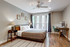 Spacious master bedroom with a king bed