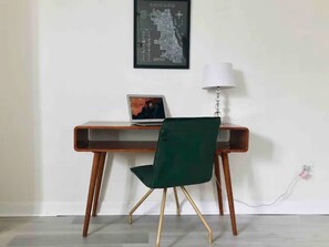 This desk makes staying at my place so convenient for WFH travelers!