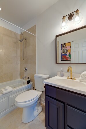 One of two full bathrooms