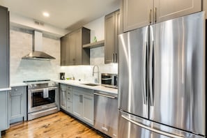 The kitchen is a new rehab, with stainless steel appliances