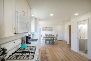 Kitchen is equipped with everything you need to make a meal including spices