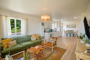 Open living and kitchen area allows you to cook and mingle at the same time