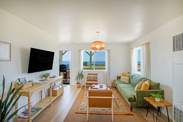 Take in beautiful ocean view while relaxing in a living area