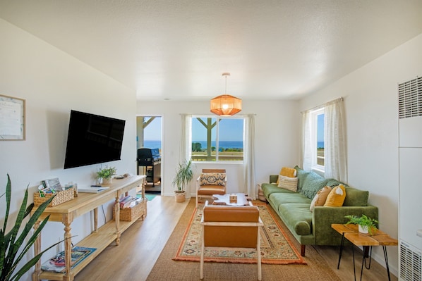 Take in beautiful ocean view while relaxing in a living area