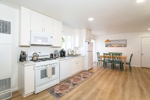 Kitchen is equipped with everything you need to make a meal including spices