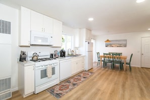 Kitchen is equipped with everything you need to make a meal including spices