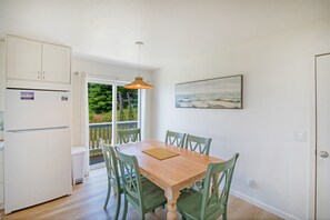 Dining table accommodates 6 comfortably