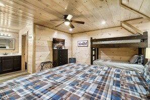 The upstairs includes a memory foam king bed, twin bunks, a reading nook, and the kids club house.