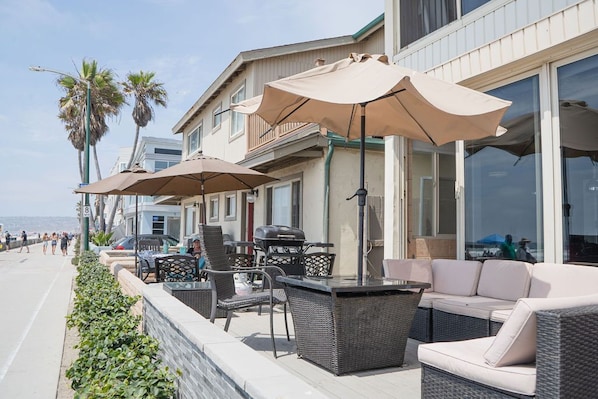 Amazing beachfront lounge right on the Ocean boardwalk. Views & people watching!