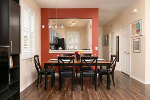 Lovely integrated dining area seating up to 6 people, showcasing elegant decor.