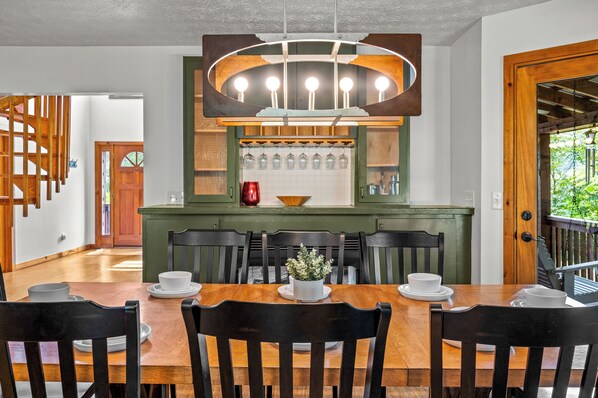 Fireplace and storage, near the dining table.