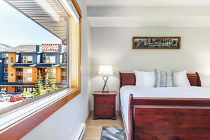 Master suite with king bed, TV and private desk space (if you really have to!).