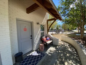 Front porch sitting area and greenspace!