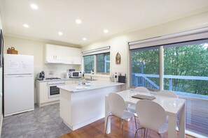 Step into our cozy kitchen—perfect for laughter and unforgettable moments