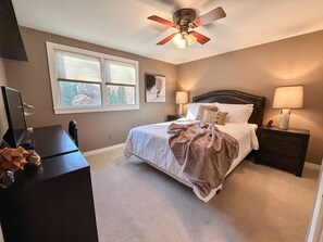 Poplar Suite- Queen bed, work station, spacious closet and 32 inch TV.