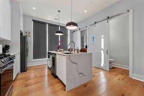 Fully stocked Kitchen with half-bath