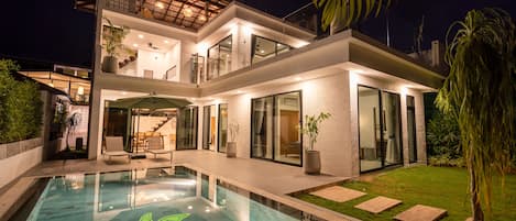 View of the house from the pool-side sala. 