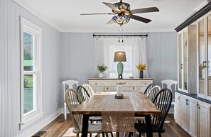 Eight person dining room with beautiful Acacia table and farmhouse chairs