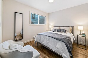 Queen size bed with walk-in closet. 