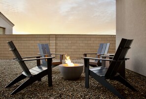 Enjoy an Arizona sunset with our propane firepit.