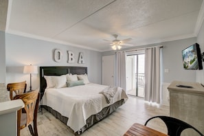 Studio condo featuring a king-size bed.