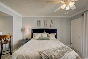 Studio condo featuring a king-size bed.