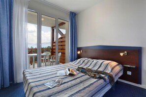 Relax on the comfy bed after a day outside.