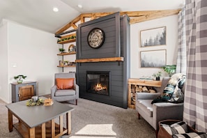 TV is hidden behind barn door