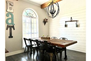 Dining room seats 8 comfortably with  more seating in wine bar/ breakfast area
