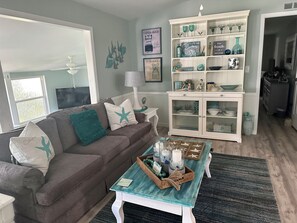Open concept living, dining, and kitchen areas