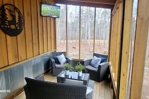Screened in porch for relaxing, watching tv, and simply enjoying a peaceful getaway!